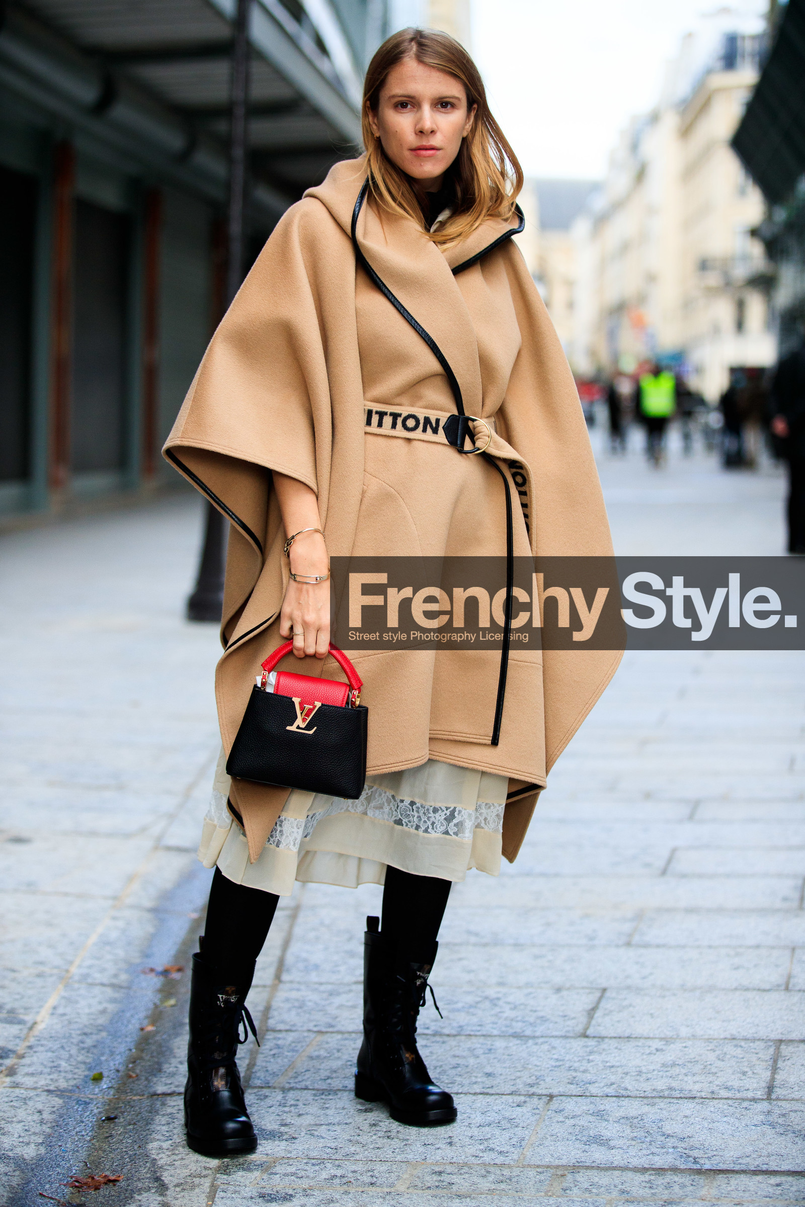 monica ainley, beige cape, beige coat, belted cape, belted coat, silk skirt, lace skirt, mid long skirt, white skirt, black leather bag, black leather boots, logo printed belt, flat boots, laced boots, red leather bag, hand bag, monogrammed bag, louis vuitton bag, louis vuitton cape, louis vuitton coat, louis vuitton boots, golden bracelet, goossens bracelet, PARIS, PFW, fashion week, frenchystyle, FW, jonathan paciullo, street style, SPRING SUMMER 2021, SS 21, vertical, full length