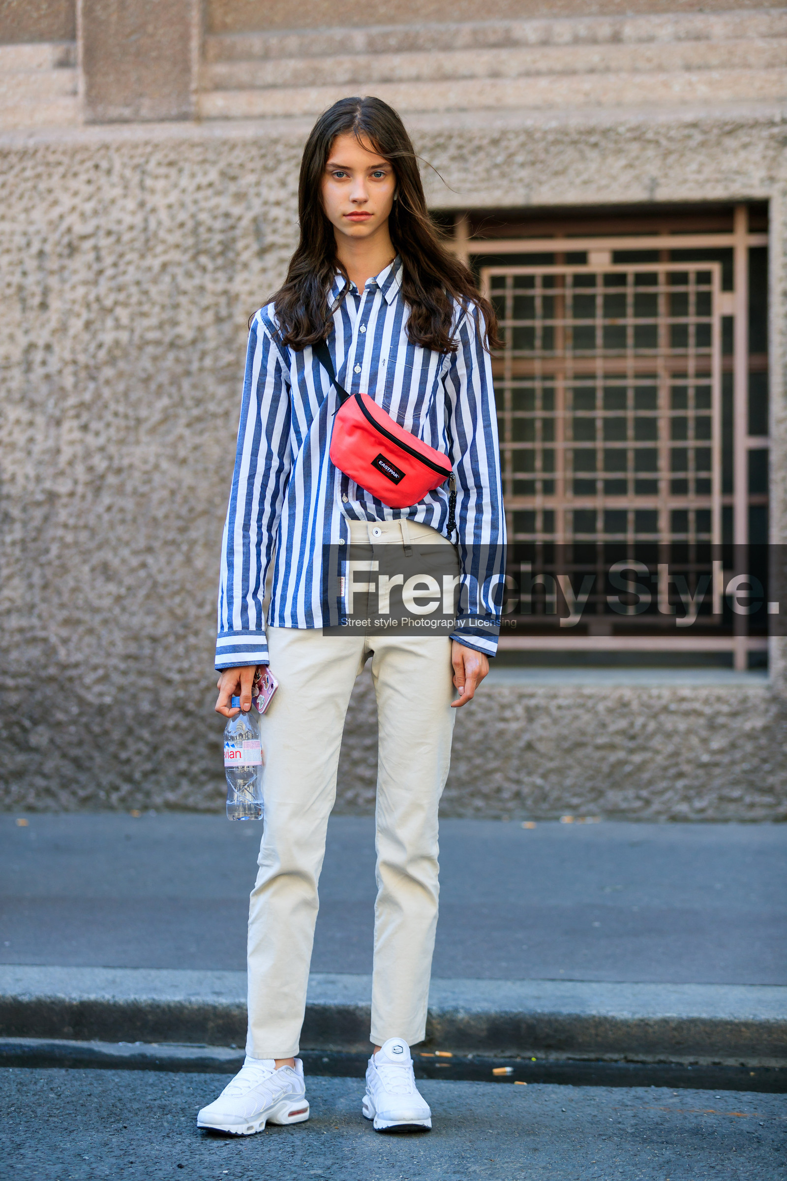 blue shirt, denim pants, eastpack, fanny pack, graphic shirt, jeans, leather bag, leather shoes, printed shirt, red bag, striped shirt, trousers, tucked in, white denim, white sneakers, fashion week, frenchystyle, FW, jonathan paciullo, street style, PFW, PARIS, vertical, full length, model, AUTUMN WINTER 2018-2019, FALL WINTER 2018-2019, FW 18-19