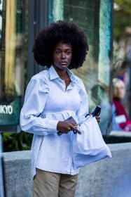 afro hairstyle, beige pants, bra, knitted bra, pants, shirt, sneakers, white bra, white shirt, fashion week, frenchystyle, FW, jonathan paciullo, street style, PFW, PARIS, SPRING SUMMER 2022, SS 22, vertical, atmosphere details