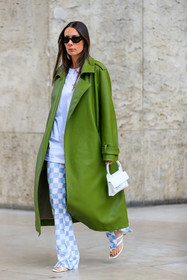 green leather coat, white t-shirt, white leather bag, mini bag, hand bag, letter printed bag, long coat, oversize coat, oversize t-shirt, checked pants, white pants, light blue pants, flare pants, silk pants, blue pants, bicolor pants, alice barbier, fashion week, frenchystyle, FW, jonathan paciullo, street style, PFW, PARIS, SPRING SUMMER 2022, SS 22, vertical, full length