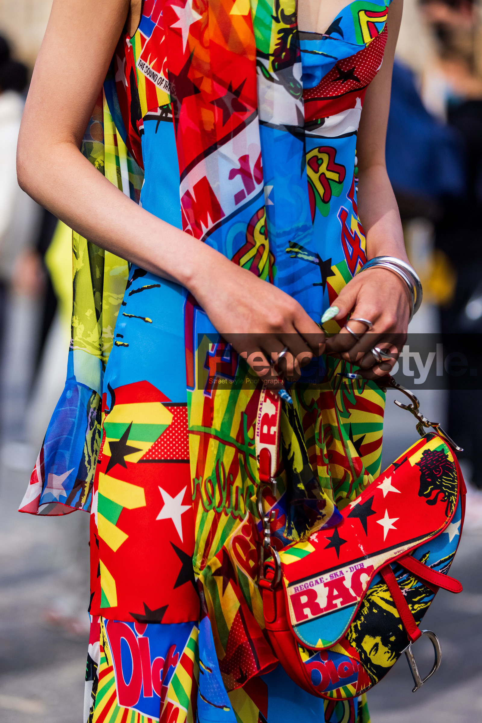 bag, blue dress, color, dior bag, dior look, dior print, leather bag, multicolor, multicolor dress, printed bag, printed ress, red bag, red dress, ring, saddle bag, silver bracelet, silver ring, star, yellow dress, street style, jonathan paciullo, FW, frenchystyle, fashion week, PFW, PARIS, SPRING SUMMER 2022, SS 22, vertical, atmosphere details