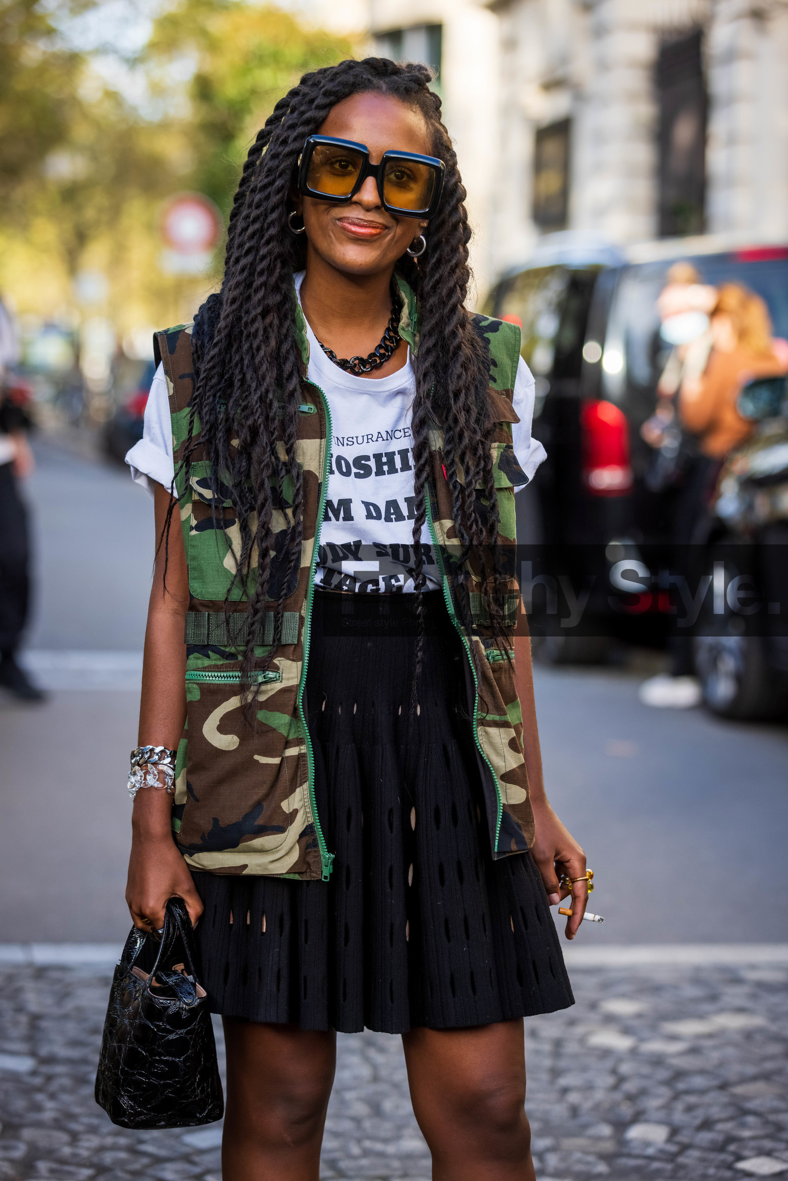 bag, black bag, black t-shirt, bracelet, chain necklace, dior bag, green skirt, leather bag, Lolo Zouai, necklace, pink hair, pleated skirt, printed t-shirt, saddle bag, skirt, t-shirt, vintage t-shirt, street style, jonathan paciullo, FW, frenchystyle, fashion week, PFW, PARIS, SPRING SUMMER 2022, SS 22, vertical, atmosphere details