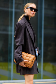 pernille teisbaek, celine sunglasses, black sunglasses, futurist shape sunglasses, black top, turtleneck top, zipped top, denim shorts, mini shorts, light blue denim shorts, striped jacket, dark grey jacket, oversize jacket, plaited bag, camel leather bag, bottega veneta bag, fashion week, frenchystyle, FW, jonathan paciullo, street style, MFW, MILAN, SPRING SUMMER 2020, SS 20
