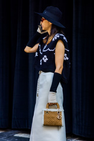camel, furry bag, lady dior mini, wideleg pants, white, chanel, black, knitted top, glove, hat, high waisted, trousers, fashion week, frenchystyle, FW, jonathan paciullo, street style, SPRING SUMMER 2022, SS 22, LFW, LONDON, vertical, atmosphere details, detail