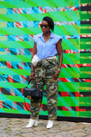 scale sunglasses, celine sunglasses, pearl earrings, dangling earrings, multi necklace, chain necklace, charms necklace, big chain necklace, lucky charm bracelet, multicolor bracelet, pearl bracelet, chanel watch, golden watch, cartier ring, golden rings, striped shirt, sleeveless shirt, blue shirt, white shirt, kaki jumpsuit, military jumpsuit, military printed jumpsuit, knot details, knoted jumpsuit, black leather bag, monogrammed bag, fendi bag, golden buckle bag, hand bag, white leather boots, high heels boots, laced boots, chain strap watch, fashion week, frenchystyle, FW, jonathan paciullo, street style, PFW, PARIS, SPRING SUMMER 2020, SS 20, horizontal, full length