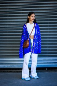 blue cardigan, long cardigan, knitted cardigan, tank top, white top, big loop earrings, blue, butterfly necklace, white trousers, white pants, printed cardigan, crossbody bag, brown crossbody, leather bag, fashion week, frenchystyle, FW, jonathan paciullo, street style, vertical, full length