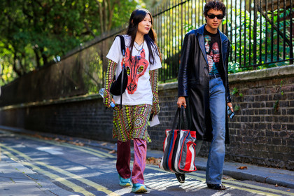 white t-shirt, printed t-shirt, short sleeves t-shirt, oversize t-shirt, flower printed dress, long sleeves dress, pearl necklace, wooden pearl necklace, burgundy pants, satin pants, black bag, velvet bag, sneakers, light blue sneakers, shoulder bag, leather jacket, black leather jacket, long jacket, denim, balenciaga bag, shopping bag, striped bag, cowboy boots, black boots, sunglasses, black sunglasses, fashion week, frenchystyle, FW, jonathan paciullo, street style, atmosphere details, horizontal, full length