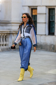 prada sunglasses, butterfly sunglasses, yellow sunglasses, black sunglasses, striped jumpsuit, blue jumpsuit, white jumpsuit, yellow leather boots, geometrical heel, silk jumpsuit, pearl earrings, heart shape earrings, fashion week, frenchystyle, FW, jonathan paciullo, street style, vertical, full length
