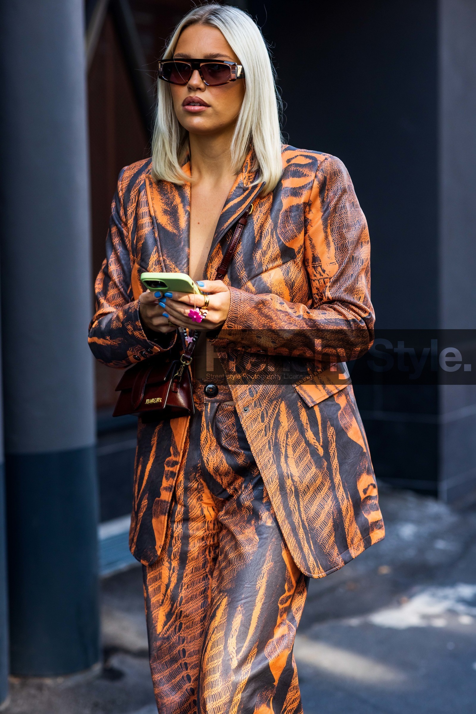 blazer, Caroline Ebo, jacquemus bag, leather bag, leather blazer, leather pants, orange blazer, orange pants, printed blazer, printed pants, red bag, smartphone, suit, sunglasses, fashion week, frenchystyle, FW, jonathan paciullo, street style, MFW, MILAN, SPRING SUMMER 2022, SS 22, vertical, atmosphere details, detail