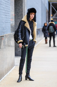 acne studios, AUTUMN WINTER 2016-2017, AW 16-17, backpack, black boots, black hat, black jacket, black pants, black shirt, chapka, fashion week, frenchystyle, full length, fur collar, fur hat, FW, FW 16-17, green belt, jonathan paciullo, leather boots, leather jacket, leather perfecto, model, NEW YORK, NYFW, sheep fur, street style, suede jacket, teddy quinlivan, varnished leather shoes, vertical, woman