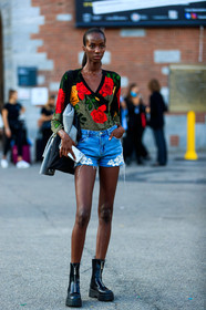 floral printed blouse, low necked blouse, black blouse, red blouse, denim, denim shorts, floral embroidered shorts, black leather boots, zipped boots, big sole boots, flat boots, low boots, fashion week, frenchystyle, FW, jonathan paciullo, street style, MFW, MILAN, SPRING SUMMER 2021, SS 21, vertical, full length, model