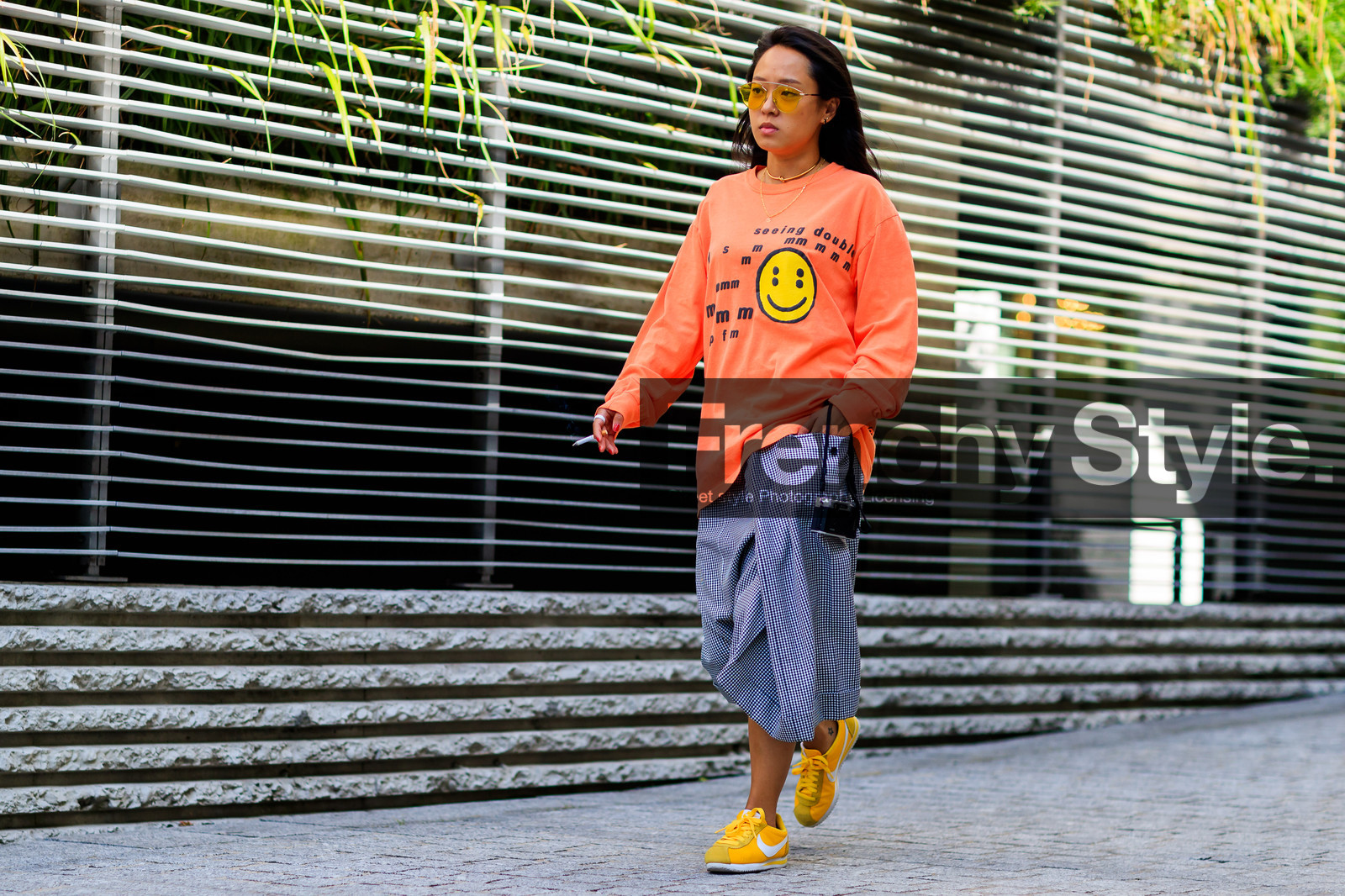 atmosphere details, camera, christina paik, fashion week, frenchystyle, full length, FW, graphic skirt, grey skirt, horizontal, jonathan paciullo, leather shoes, MENSWEAR, nike, orange sweater, PARIS, PFW, plaid, printed skirt, printed sweater, smiley, SPRING SUMMER 2018, SS 18, street style, sunglasses, tattoos, yellow sneakers