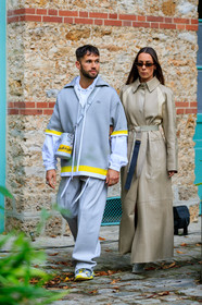 alice & j.s, alice barbier, JS roques, lacoste jacket, lacoste pullover, lacoste total look, lacoste coat, lacoste trenchcoat, lacoste pants, light grey jacket, light grey pullover, light grey pants, white shirt, raincoat, beige leather trench coat, belted trench coat, crossbody bag, bucket bag, light grey leather bag, louis vuitton bag, monogrammed bag, futurist shape sunglasses, small sunglasses, polish boots, beige boots, low boots, yellow hoodie, yellow jacket, yellow sweatshirt, PARIS, PFW, SPRING SUMMER 2020, SS 20, fashion week, frenchystyle, FW, jonathan paciullo, street style, vertical, full length
