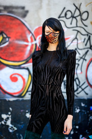 black jumpsuit, velvet jumpsuits, zebra printed jumsuit, long sleeves jumpsuit, tight jumpsuit, monogrammed bag, brown leather bag, louis vuitton bag, hand bag, shopping bag, animal print, leopard print, covid face mask, hannah elyse, street style, jonathan paciullo, FW, frenchystyle, fashion week, MFW, MILAN, SPRING SUMMER 2021, SS 21, vertical, detail, model