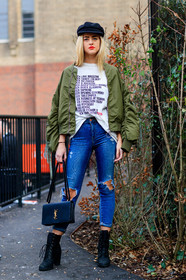 AUTUMN WINTER 2017-2018, AW 17-18, beret, black bag, black boots, black hat, black shoes, blue denim, bomber jacket, denim pants, FALL WINTER 2017-2018, fashion week, frenchystyle, full length, FW, FW 17-18, green jacket, high heels, jeans, jonathan paciullo, leather bag, leather shoes, LFW, LONDON, message, over the shoulder, printed t shirt, red lips, saint laurent paris, street style, trousers, tucked in, vertical, white t shirt
