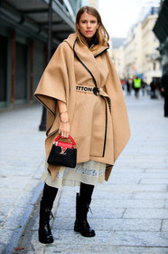 monica ainley, beige cape, beige coat, belted cape, belted coat, silk skirt, lace skirt, mid long skirt, white skirt, black leather bag, black leather boots, logo printed belt, flat boots, laced boots, red leather bag, hand bag, monogrammed bag, louis vuitton bag, louis vuitton cape, louis vuitton coat, louis vuitton boots, golden bracelet, goossens bracelet, PARIS, PFW, fashion week, frenchystyle, FW, jonathan paciullo, street style, SPRING SUMMER 2021, SS 21, vertical, full length