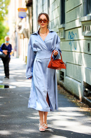 yuzefi bag, red bag, red leather bag, hand bag, mini bag, light blue dress, satin dress, satin belt, belted dress, low necked dress, long sleeves dress, long dress, golden necklace, multi necklace, golden earrings, hoop earrings, shell necklace, white leather sandals, white sandals, multi straps sandals, brown sunglasses, red sunglasses, futurist shape sunglasses, fashion week, frenchystyle, FW, jonathan paciullo, street style, MFW, MILAN, SPRING SUMMER 2021, SS 21, vertical, full length