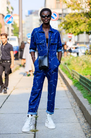 black bag, black bra, blue denim, denim jumpsuit, jil sander, leather bag, leather shoes, model, printed jumpsuit, puma, sunglasses, trousers, white sneakers, street style, jonathan paciullo, FW, frenchystyle, fashion week, MFW, MILAN, SPRING SUMMER 2019, SS 19, vertical, full length