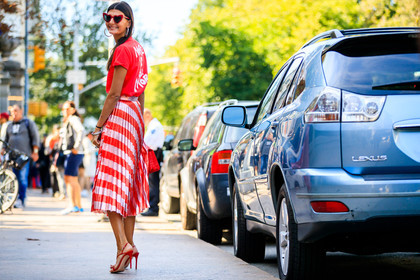 atmosphere details, back detail, fashion week, frenchystyle, full length, FW, giovanna battaglia, high heels, horizontal, jonathan paciullo, leather bag, leather shoes, metallic skirt, NEW YORK, NYFW, pleated skirt, printed skirt, printed t shirt, red bag, red shoes, red skirt, red t shirt, SPRING SUMMER 2018, SS 18, street style, striped skirt, sunglasses
