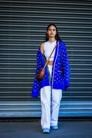 blue cardigan, long cardigan, knitted cardigan, tank top, white top, big loop earrings, blue, butterfly necklace, white trousers, white pants, printed cardigan, crossbody bag, brown crossbody, leather bag, fashion week, frenchystyle, FW, jonathan paciullo, street style, vertical, full length