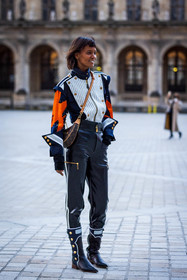 black boots, black jacket, black pants, boots, jacket, leather boots, Liya Kebede, louis vuitton look, orange jacket, pants, patent pants, printed jacket, stripes, fashion week, frenchystyle, FW, jonathan paciullo, street style, PFW, PARIS, SPRING SUMMER 2022, SS 22, vertical, full length