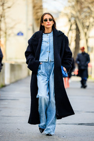 black coat, fluffy coat, black sunglasses, silver earrings, pastel blue cardigan, buttoned cardigan, light blue jeans, baggy jeans, chanel bag, blue handbag, small bag, black heels, black shoes, fashion week, frenchystyle, FW, jonathan paciullo, street style, PFW, PARIS, menswear, AUTUMN WINTER 2022-2023, FALL WINTER 2022-2023, FW 22-23, full length, vertical