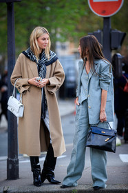 camille charriere, beige coat, white pants, high waist pants, high boots, black scarf, black polish boots, bandana, bandana scarf, hermes scarf, white leather bag, quilted bag, chanel bag, black leather boots, chloe loulou de saison, light grey pants, light grey jacket, light grey suits, linen pants, linen jacket, linen suits, oversize jacket, oversize pants, oversize suits, three pieces suits, black leather bag, hermes bag, birkin hermes bag, kelly hermes bag, black sunglasses, bottega veneta sunglasses, butterfly sunglasses, hand bag, PARIS, PFW, fashion week, frenchystyle, FW, jonathan paciullo, street style, SPRING SUMMER 2021, SS 21, vertical, full length