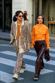 orange blouse, drape blouse, cropped blouse, silk blouse, burgundy leather pants, burgundy leather bag, flare pants, acne studios bag, acne studios look, acne studios pants, acne studios blouse, hand bag, alice barbier, acne studios jacket, acne studios look, orange top, fishnet top, monogrammed jacket, monogrammed pants, monogrammed look, beige jacket, beige pants, beige suits, printed jacket, printed pants, logo all over, logo printed jacket, logo printed pants, aviator sunglasses, sheer sunglasses, beige shoes, beige suede shoes, big sole derbies, big sole shoes, beige derbies, beige suede derbies, JS roques, fashion week, frenchystyle, FW, jonathan paciullo, street style, PFW, PARIS, SPRING SUMMER 2022, SS 22, vertical, full length