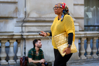 knit top, knitwear, yellow pullover, openwork pullover, hermes scarf, golden clutch, gold leather clutch, golden cuff, brown stone bracelet, fashion week, frenchystyle, FW, jonathan paciullo, street style, atmosphere details, horizontal, detail