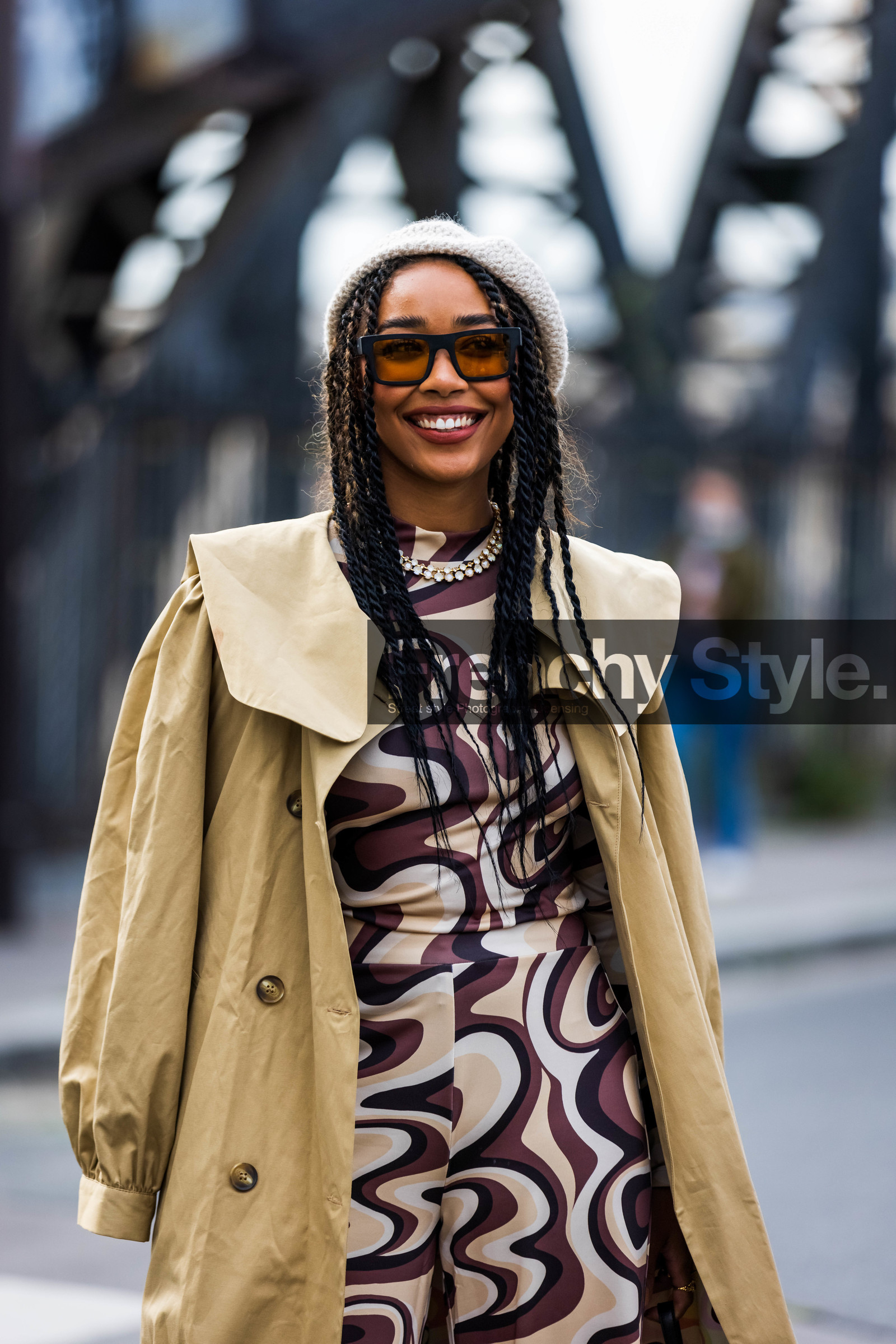Petra Henriette, 70s print, beanie, beige beanie, beige jumpsuit, beige trench, black and brown jumpsuit, statement collar, collar, jumpsuit, printed jumpsuit, silver necklace, sunglasses, trench, wool beanie, fashion week, frenchystyle, FW, jonathan paciullo, street style, PFW, PARIS, SPRING SUMMER 2022, SS 22, vertical, atmosphere details