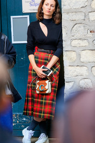 black top, high collar top, openwork top, low necked top, red skirt, checked skirt, plaid skirt, mid long skirt, belted skirt, iphone, chloe bag, white leather bag, brown leather bag, monogrammed bag, mini bag, hand bag, white sneakers, pleated skirt, grey socks, wrap top, PARIS, PFW, SPRING SUMMER 2020, SS 20, fashion week, frenchystyle, FW, jonathan paciullo, street style, vertical, atmosphere details, detail