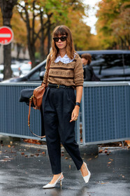 natasha goldenberg, camel pullover, beige pullover, brown pullover, jacquard pullover, big collar, miu miu pullover, miu miu shirt, dark grey pants, carrot pants, belted pants, black leather belt, animal skin belt, big ring, cartier ring, animal shape ring, brown leather bag, sling back shoes, white leather shoes, kitten heels shoes, sharp end shoes, PARIS, PFW, SPRING SUMMER 2020, SS 20, fashion week, frenchystyle, FW, jonathan paciullo, street style, vertical, full length