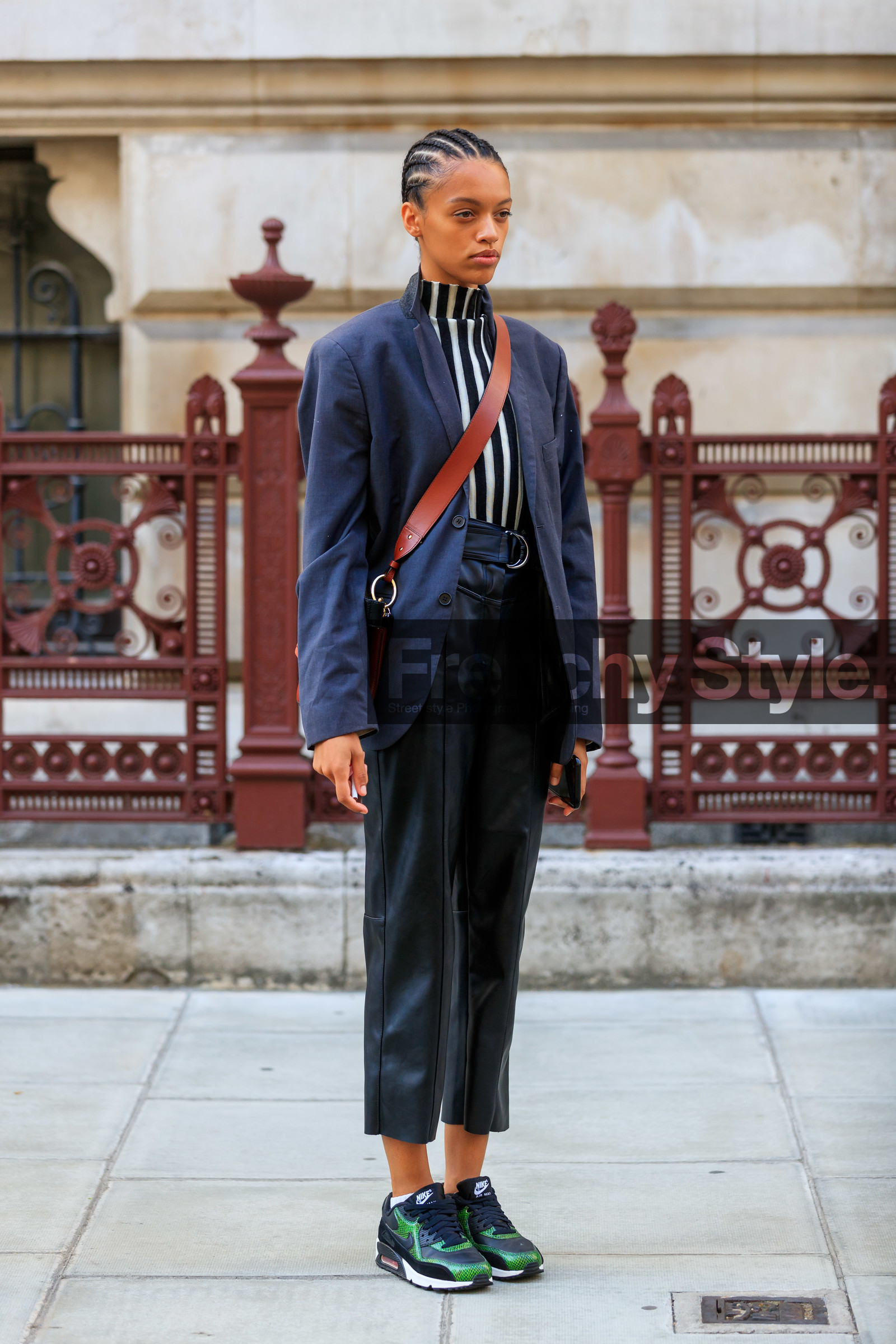 model, navy blue jacket, black leather pants, cropped pants, striped top, black top, white top, turtleneck top, crossbody bag, brown leather bag, chloe bag, hair details, plaited hair, high waist pants, nike shoes, air max sneakers, green sneakers, black sneackers, fashion week, frenchystyle, FW, jonathan paciullo, street style, vertical, full length