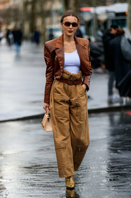 mary leest, brown jacket, vinyl jacket, brown vinyl jacket, tie and dye jacket, cropped jacket, white top, square shape glasses, small sunglasses, camel pants, camel leather belt, high waist pants, multi pocket pants, zipped pants, belted pants, nude leather bag, animal skin bag, mini bag, hand bag, golden boots, laced boots, sharp end boots, fashion week, frenchystyle, FW, jonathan paciullo, street style, PFW, PARIS, vertical, full length