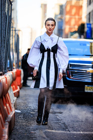 oversized white shirt, mini dress, white and black look, white and black dress, highknee boots, black boots, black clutch, carolina herrera bag, mary leest, fashion week, frenchystyle, FW, jonathan paciullo, street style, NYFW, NEW YORK, AUTUMN WINTER 2022-2023, FALL WINTER 2022_2023, FW 22-23, vertical, full length