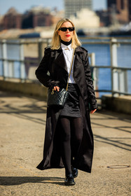 chanel crossbody, chanel bag, bucket bag, chanel bucket bag, black sunglasses, black full look, white shirt, black long trench, satin trench coat, mini skirt, black skirt, black handbag, black stockings, prada derbies, prada shoes, black derbies, leather derbies, fashion week, frenchystyle, FW, jonathan paciullo, street style, NYFW, NEW YORK, AUTUMN WINTER 2022-2023, FALL WINTER 2022_2023, FW 22-23, vertical, full length