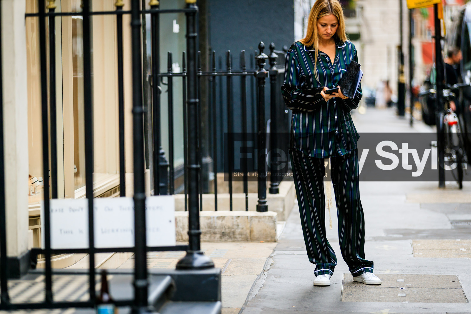 graphic pants, graphic shirt, green bag, green pants, green shirt, holly estelle russell, leather bag, leather shoes, loewe, pajamas, printed pants, printed shirt, striped pants, striped shirt, trousers, white sneakers, fashion week, frenchystyle, FW, jonathan paciullo, street style, LFW, LONDON, SPRING SUMMER 2019, SS 19, atmosphere details, horizontal, full length
