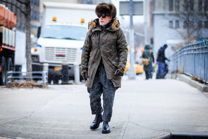 atmosphere details, AUTUMN WINTER 2016-2017, AW 16-17, black boots, blue sweater, brown coat, brown fur, brown jacket, chapka, fashion week, frenchystyle, full length, fur collar, fur hat, FW, FW 16-17, grey pants, horizontal, jonathan paciullo, leather boots, man, NEW YORK, nick wooster, NYFW, parka, safety pin, street style, sunglasses, turtleneck sweater, wide pants, wool pants