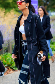 black coat, black trench coat, white bra, cropped top, red sunglasses, futurist shape sunglasses, tie and dye pants, high waist pants, blue jeans, denim, pearl earrings, dangling earrings, fashion week, frenchystyle, FW, jonathan paciullo, street style, vertical, detail, atmosphere details