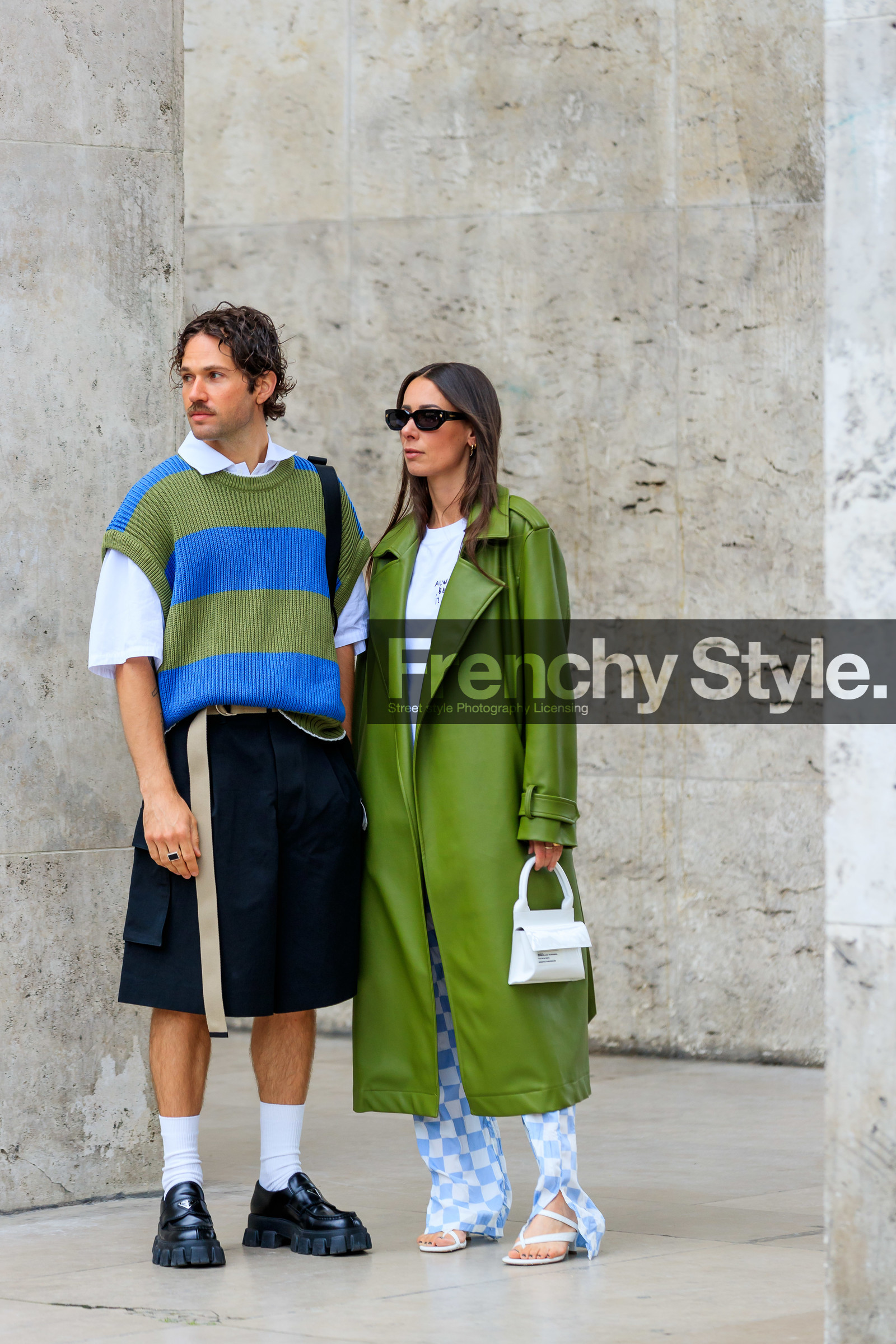 green leather coat, white t-shirt, white leather bag, mini bag, hand bag, letter printed bag, long coat, oversize coat, oversize t-shirt, checked pants, white pants, light blue pants, flare pants, silk pants, blue pants, bicolor pants, alice barbier, striped pullover, oversize pullover, green pullover, blue pullover, short sleeves pullover, sleeveless pullover, white polo shirt, black bermuda shorts, loose shorts, white socks, black leather loafers, prada shoes, prada loafers, JS roques, fashion week, frenchystyle, FW, jonathan paciullo, street style, PFW, PARIS, SPRING SUMMER 2022, SS 22, vertical, full length