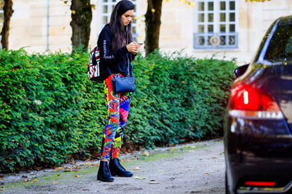 atmosphere details, backpack, black bag, black shoes, black sweater, fashion week, floral, flowers, frenchystyle, full length, FW, graphic pants, horizontal, jonathan paciullo, leather bag, leather shoes, long hair, michael kors, multicolor pants, PARIS, PFW, printed pants, SPRING SUMMER 2018, SS 18, street style, trousers, model