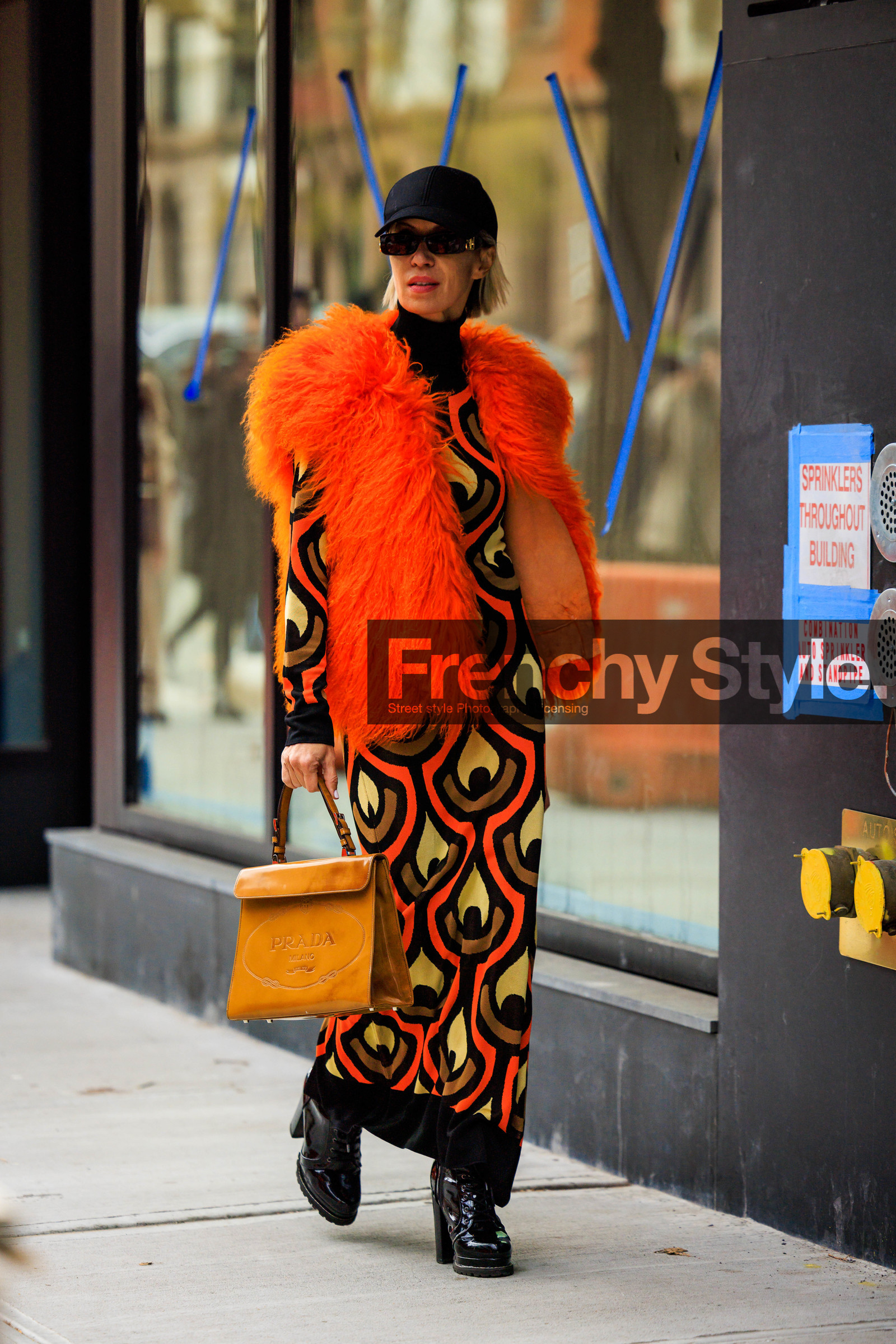 paco rabbane maxi printed dress, orange furry scarf, orange handbag, black high heeled boots, new york black cap, black sunglasses, fashion week, frenchystyle, FW, jonathan paciullo, street style, NYFW, NEW YORK, AUTUMN WINTER 2022-2023, FALL WINTER 2022_2023, FW 22-23, vertical, full length