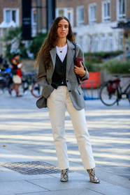 erika boldrin, grey jacket, black leather jacket, sleeveless jacket, white pants, white jeans, bottega veneta bag, mini bag, clutch, animal skin boots, green stone necklace, multi earrings, hoop earrings, golden earrings, fashion week, frenchystyle, FW, jonathan paciullo, street style, vertical, full length