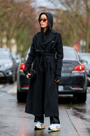 alexandra guerain, black hoodie, black trench coat, black pants, belted trench coat, off white trench coat, nike shoes, white sneakers, yellow sneakers, futurist shape sunglasses, scale sunglasses, purple sunglasses, fashion week, frenchystyle, FW, jonathan paciullo, street style, PFW, PARIS, vertical, full length