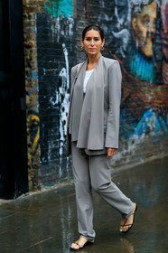 deborah reyner sebag, light beige jacket, light beige pants, light beige suits, lavalliere collar, silk suits, hoop earrings, golden earrings, black sandals, multi straps sandals, flat sandals, fashion week, frenchystyle, FW, jonathan paciullo, street style, vertical, full length