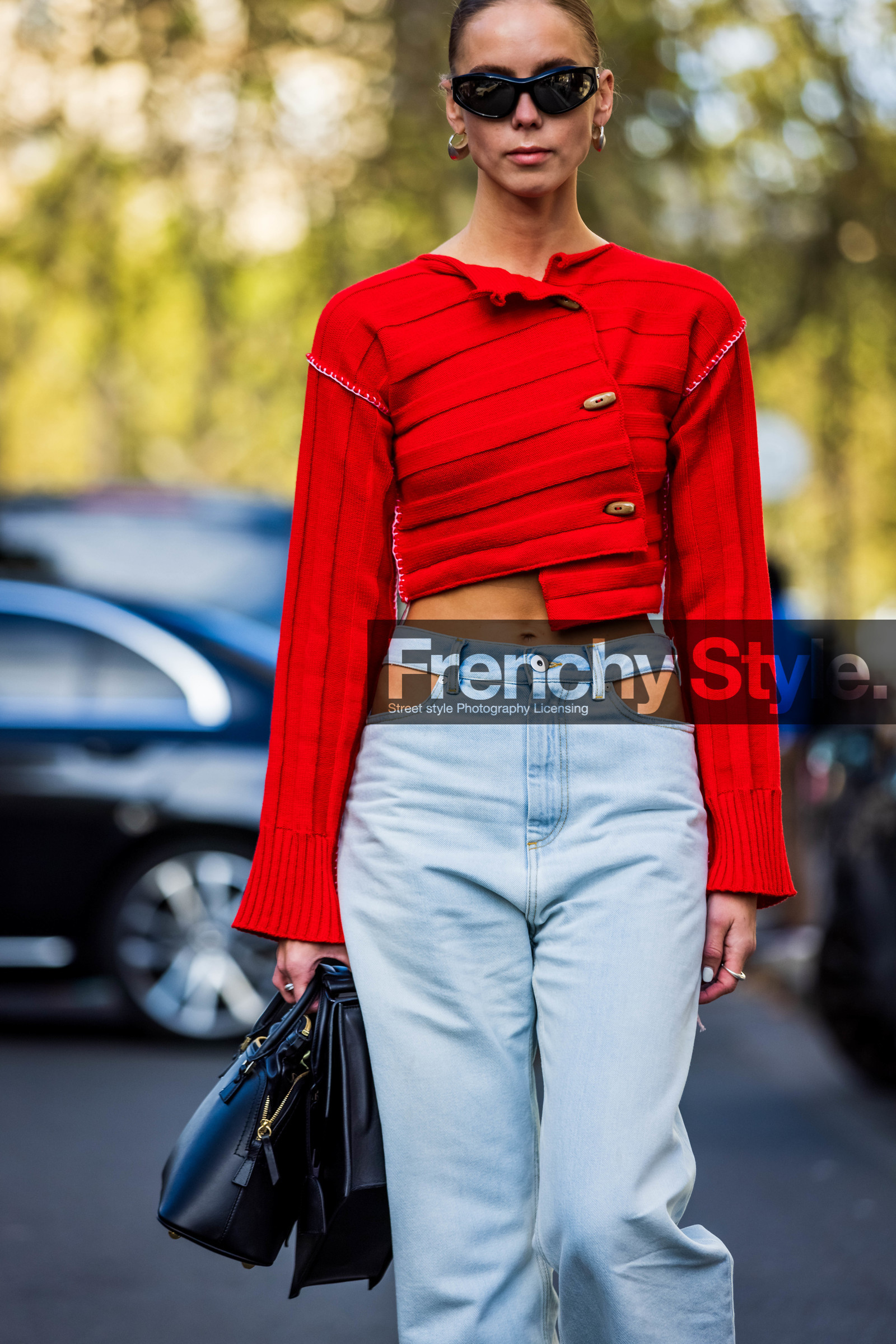 asymetrical knitwear, bag, black bag, black sunglasses, cut out pants, denim, earrings, Hilda Sandstrom, jean, knitwear, light blue denim, light blue jean, red knitwear, sunglasses, street style, jonathan paciullo, FW, frenchystyle, fashion week, PFW, PARIS, SPRING SUMMER 2022, SS 22, vertical, atmosphere details