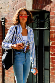 black bag, black belt, blue denim, denim pants, graphic shirt, jeans, leather bag, model, printed shirt, striped shirt, sunglasses, tied up shirt, tote bag, trousers, fashion week, frenchystyle, FW, jonathan paciullo, street style, LFW, LONDON, SPRING SUMMER 2019, SS 19, vertical, detail, atmosphere details