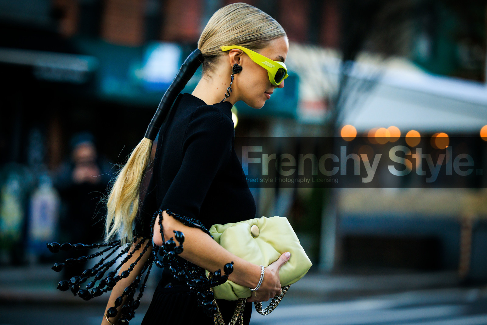 saint laurent logo earrings, puffy green pouch, green sunglasses, jacket, details, hairstyle, hair style, hair lace, leonie hanne, fashion week, frenchystyle, FW, jonathan paciullo, street style, NYFW, NEW YORK, AUTUMN WINTER 2022-2023, FALL WINTER 2022_2023, FW 22-23, atmosphere details, horizontal