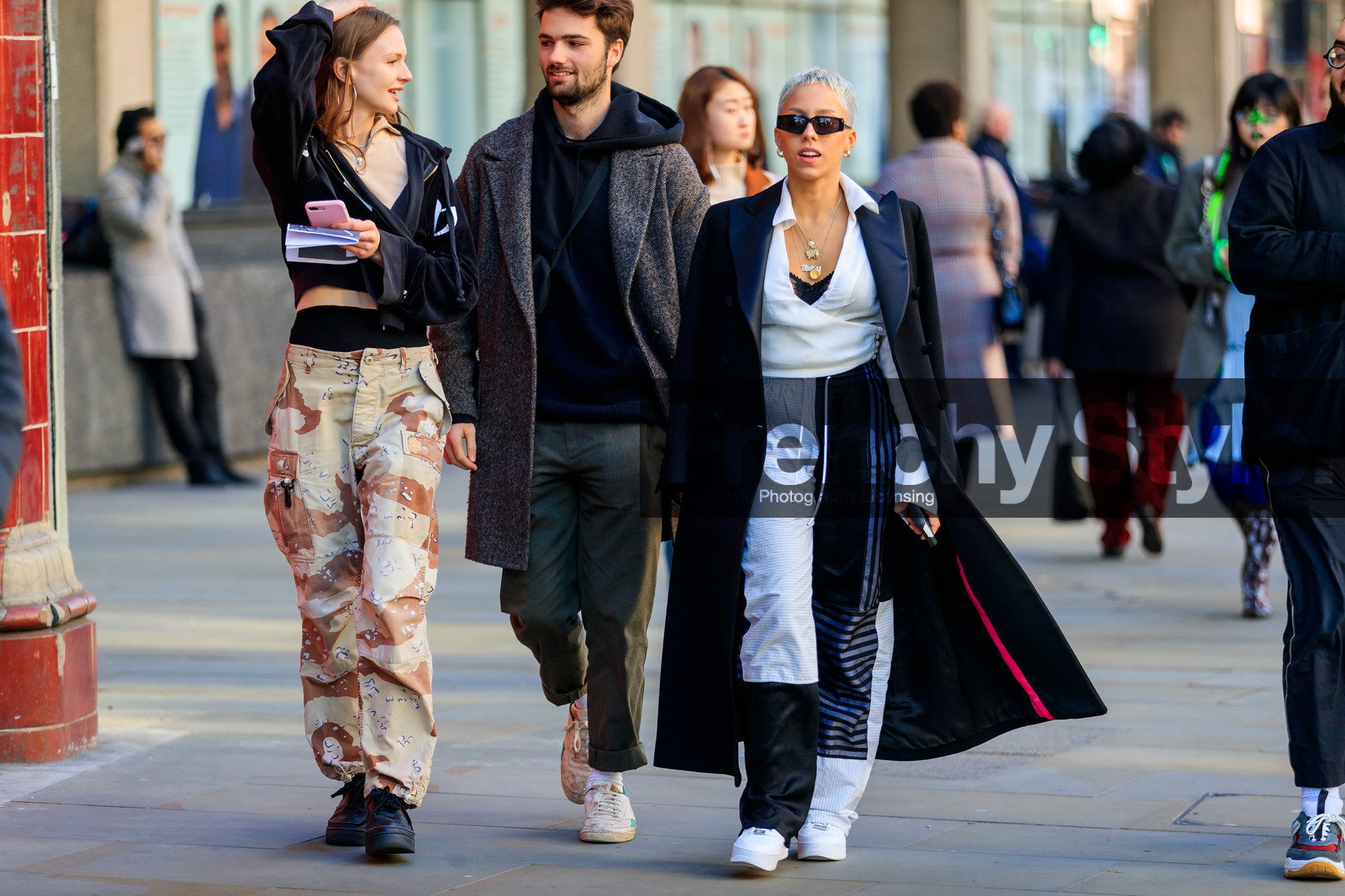 black coat, black jacket, black pants, black shoes, black sneakers, black sweater, brown coat, brown pants, camo pants, camouflage, graphic pants, green pants, hoodie, leather shoes, necklace, printed pants, sunglasses, sweatpants, trousers, white pants, white sneakers, white top, fashion week, frenchystyle, FW, jonathan paciullo, street style, LFW, LONDON, AUTUMN WINTER 2019-2020, AW 19-20, FW 19-20, FALL WINTER 2019-2020, horizontal, atmosphere details, detail