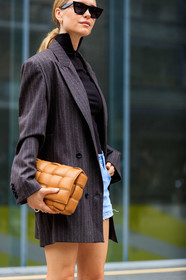 pernille teisbaek, celine sunglasses, black sunglasses, futurist shape sunglasses, black top, turtleneck top, zipped top, denim shorts, mini shorts, light blue denim shorts, striped jacket, dark grey jacket, oversize jacket, plaited bag, camel leather bag, bottega veneta bag, fashion week, frenchystyle, FW, jonathan paciullo, street style, MFW, MILAN, SPRING SUMMER 2020, SS 20